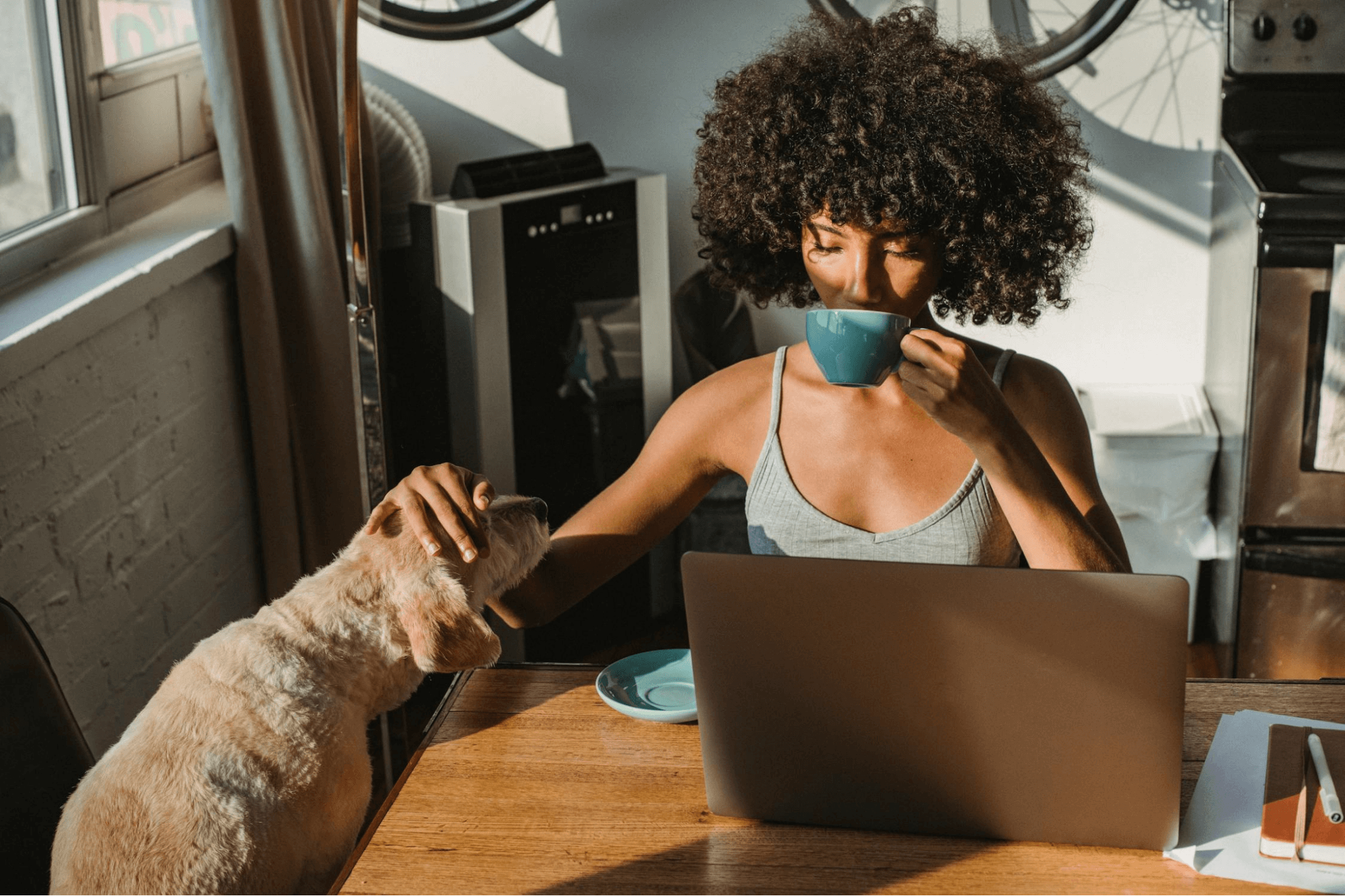 Woman working from home with her dog.
