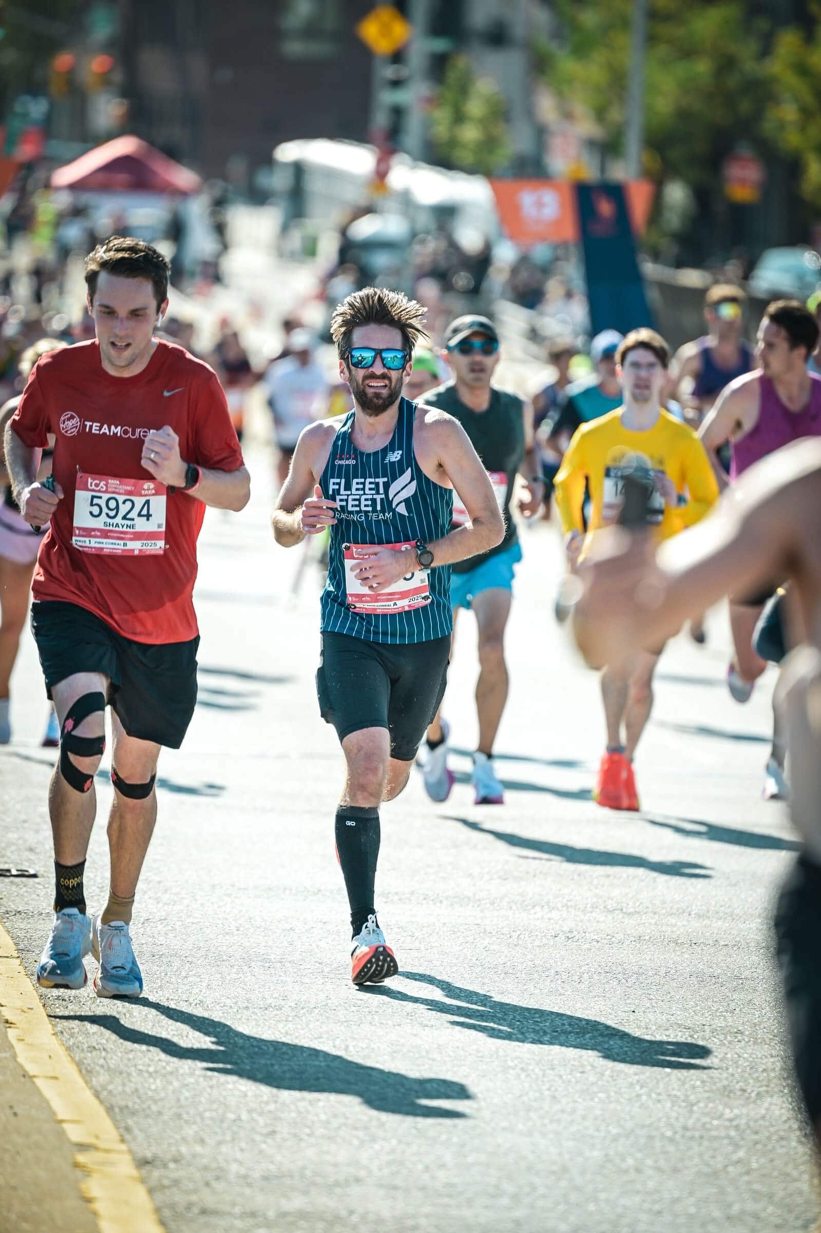 Runner wearing a calf compression sleeve for running during training