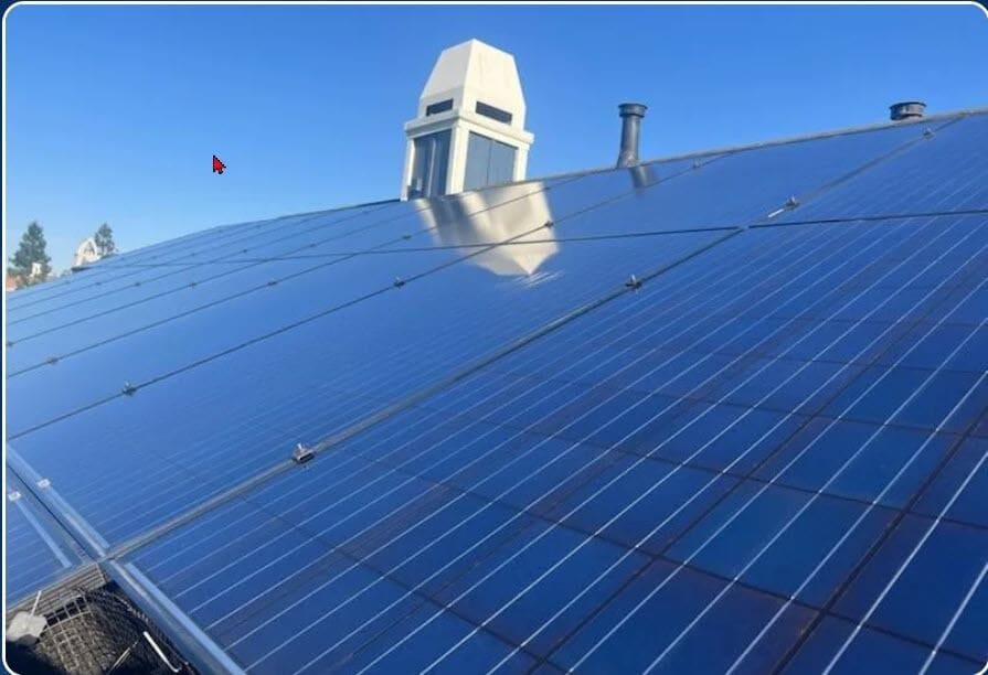 solar-clean-panels-on-roof-from-side-a-Vj6cc3.jpg