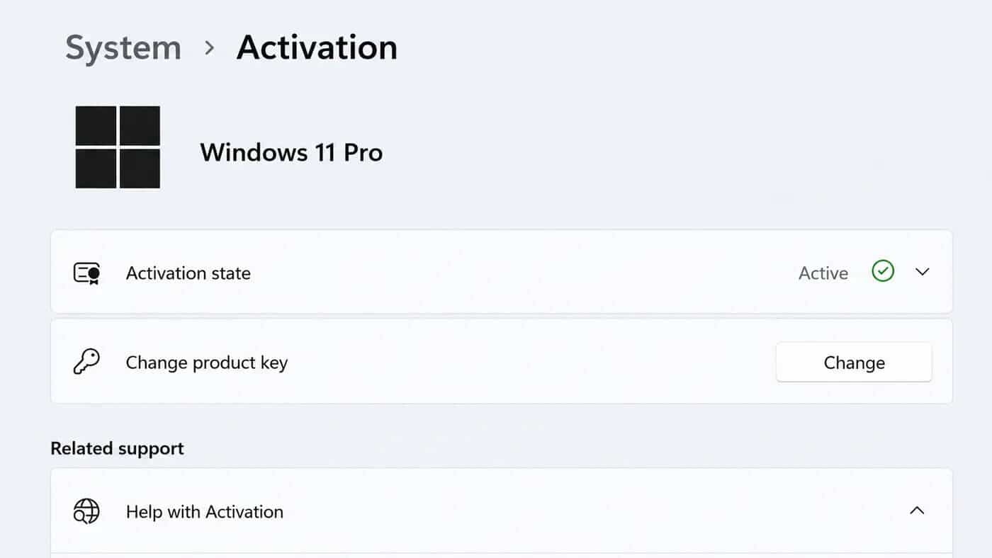 Windows 11 Settings showing System > Activation with the option to change product key