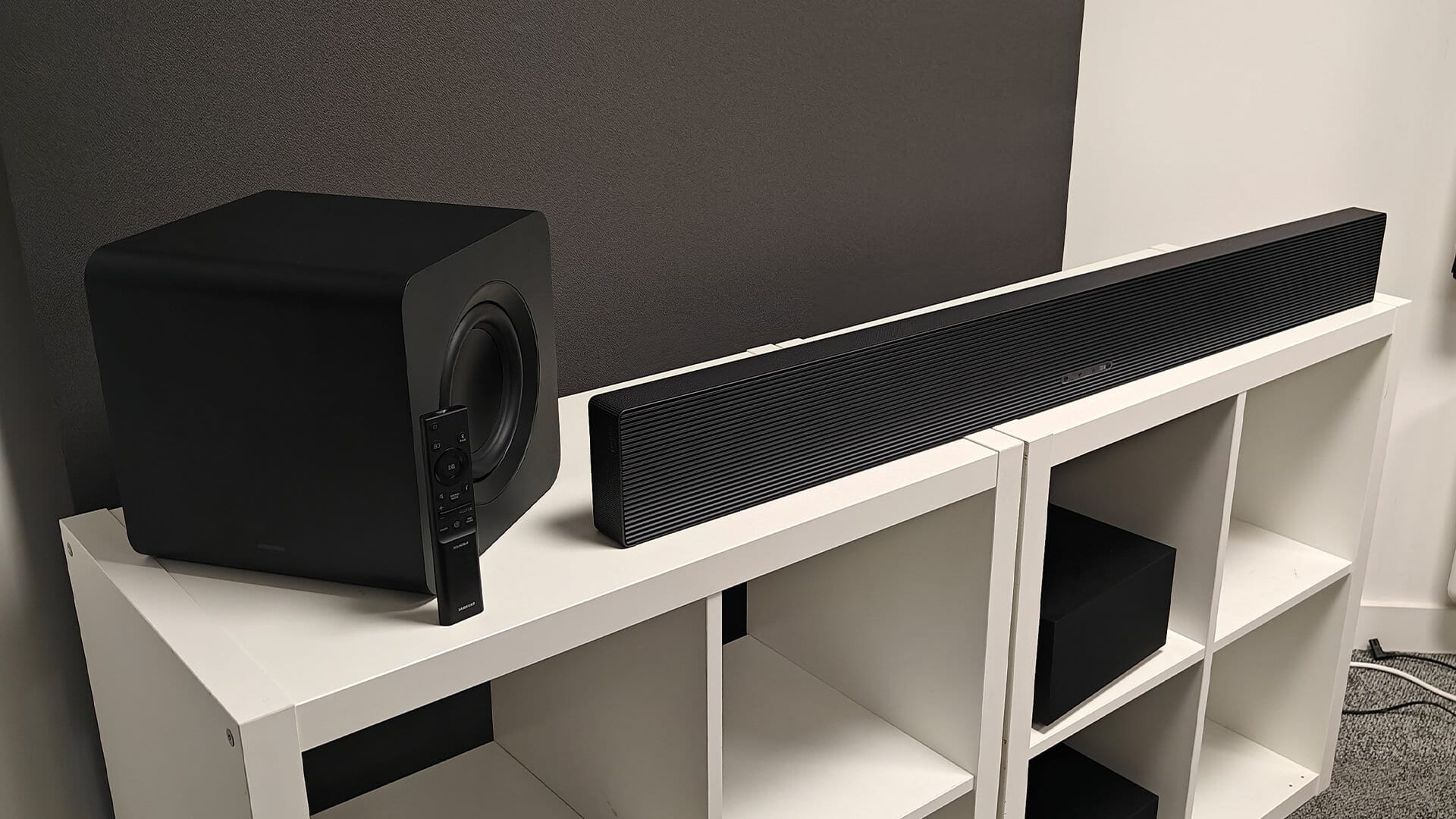 Wireless subwoofer with rounded edges and compact cubic design