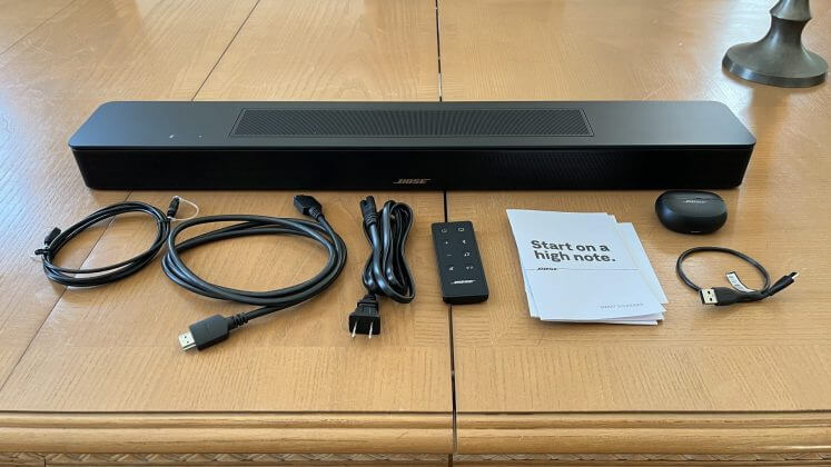 Bose Smart Soundbar displayed with accessories.