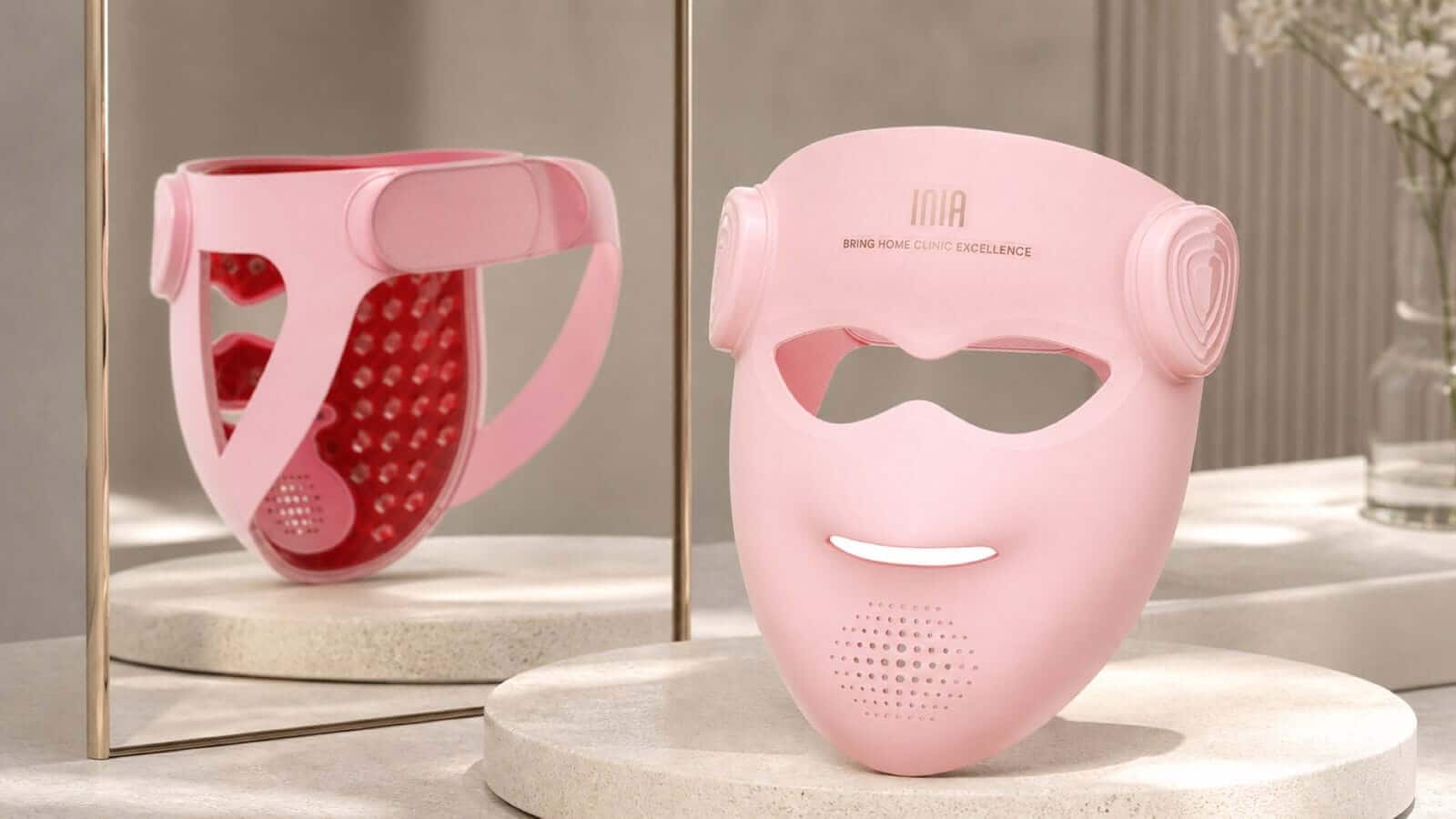 Front and interior views of INIA GLOW 4D showing the eye openings, raised nose bridge, strap, and LED layout
