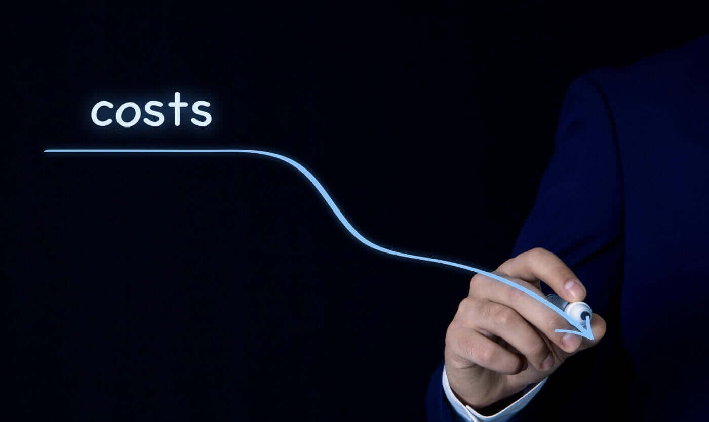 Hand drawing a downward cost curve, representing the savings from outsourcing video redaction