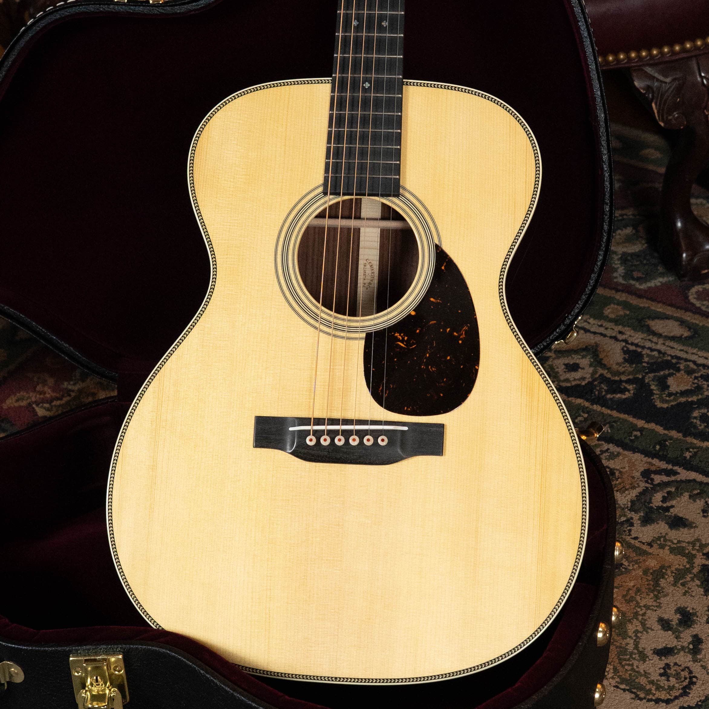 Martin custom shop Guatemalan rosewood OM-28 style, like the builds at the Martin Fretboard Summit booth