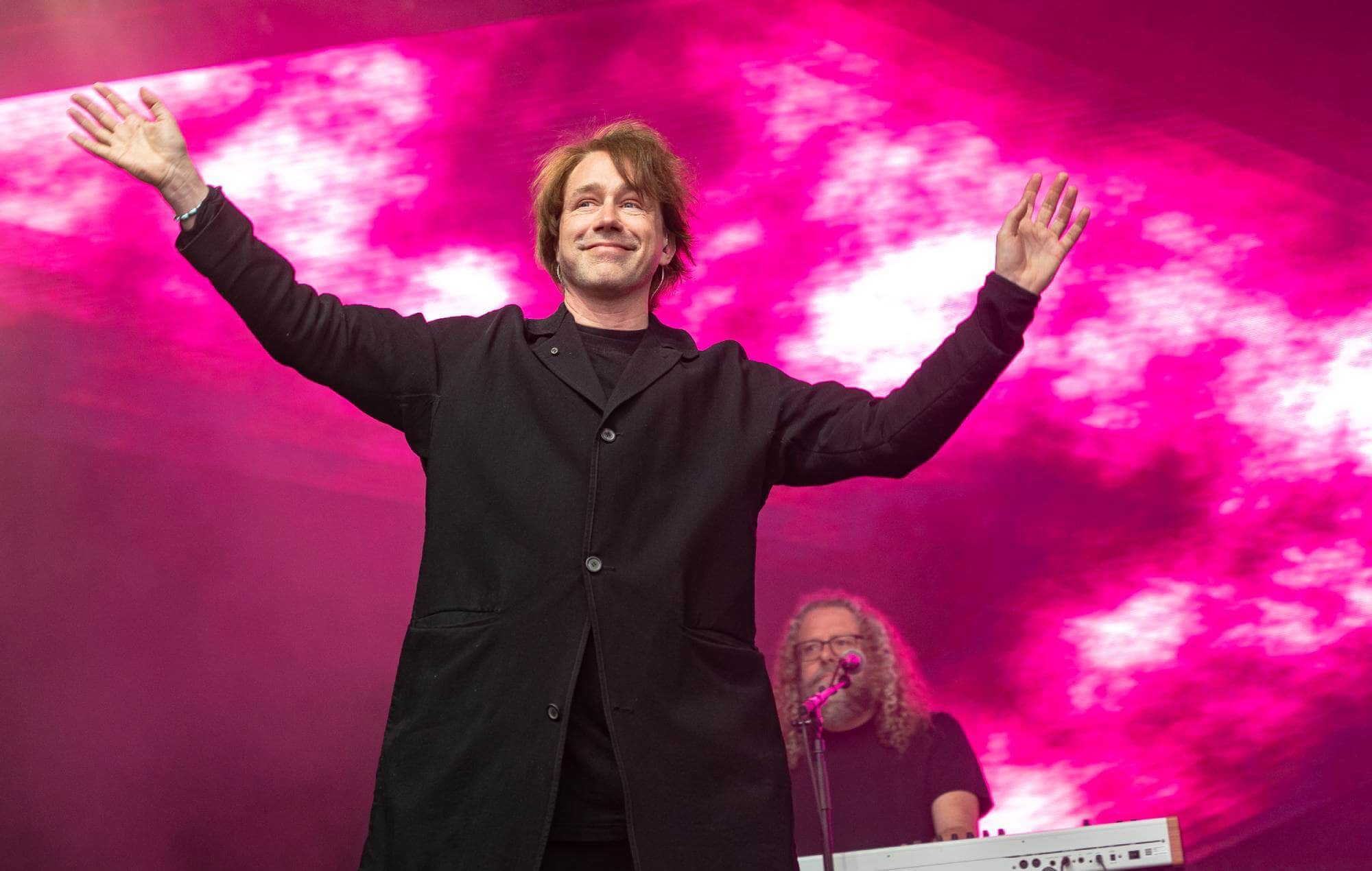 Jonas Bjerre, the captivating frontman of Mew, delivering one of their final live performances.