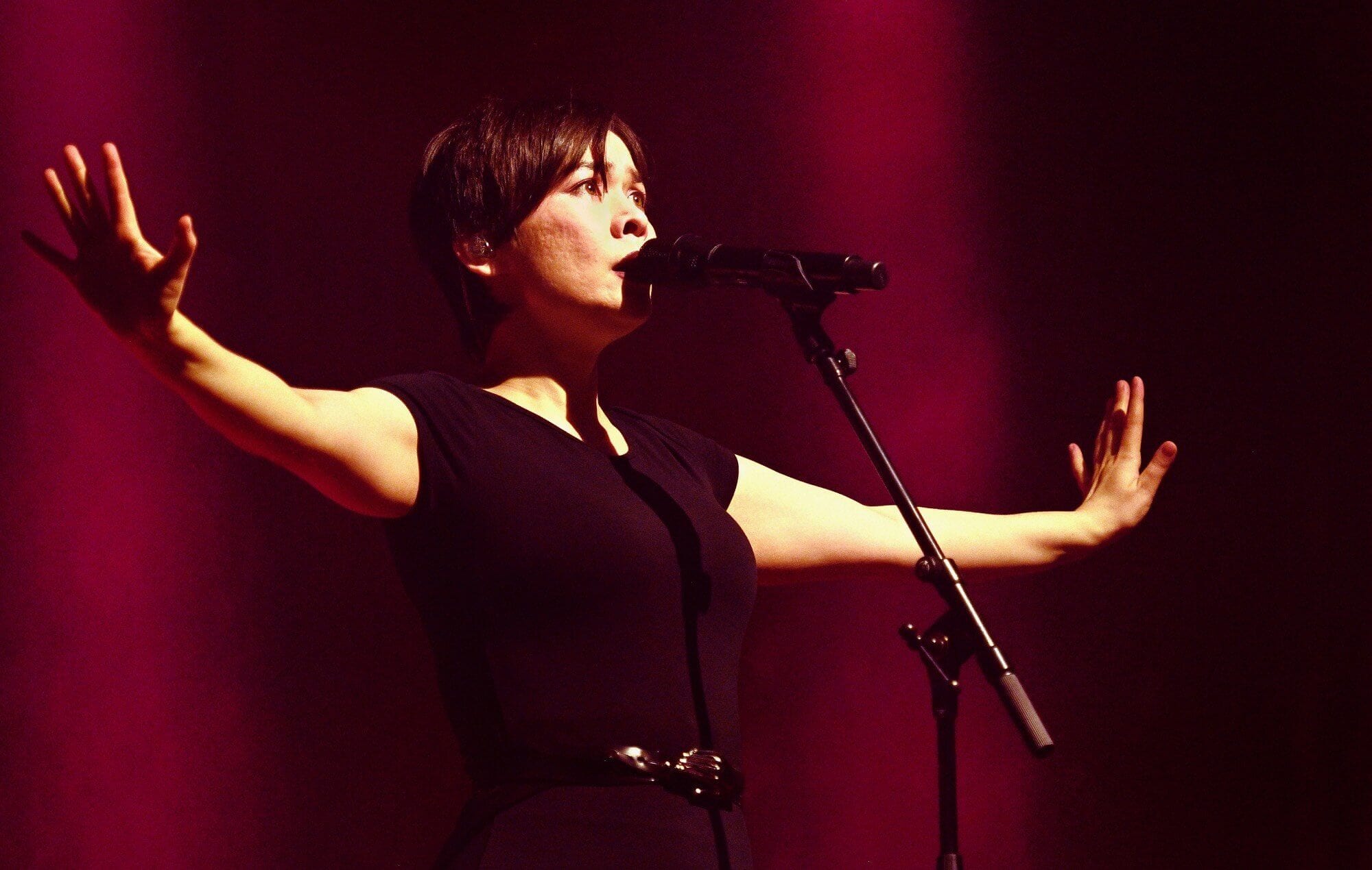 Mitski performing live on stage in London, 2024