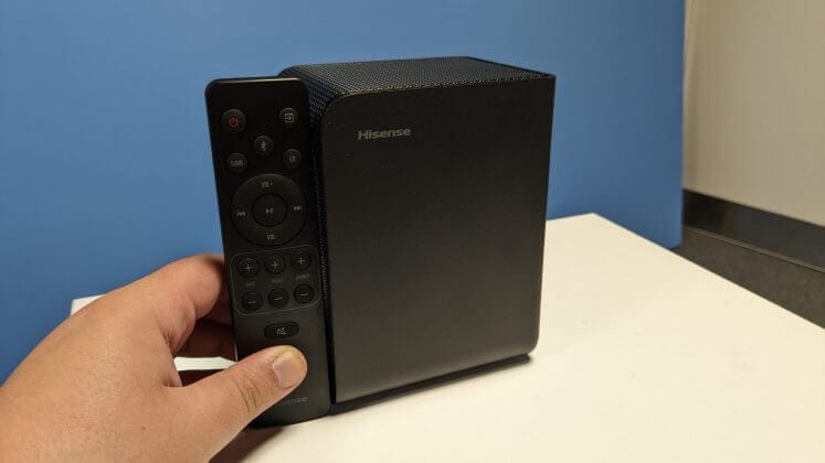 Rear speaker and remote of Hisense AX5125H.