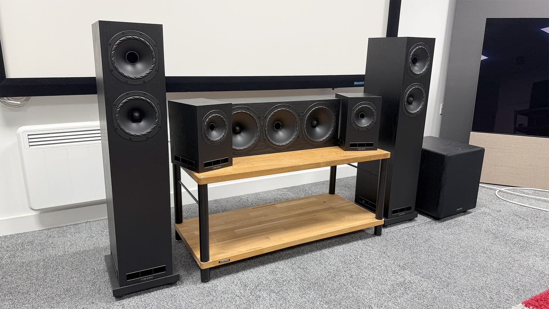 The elegant black ash finish of Fyne Audio’s F500E AV Pack 2 blends functionality and style