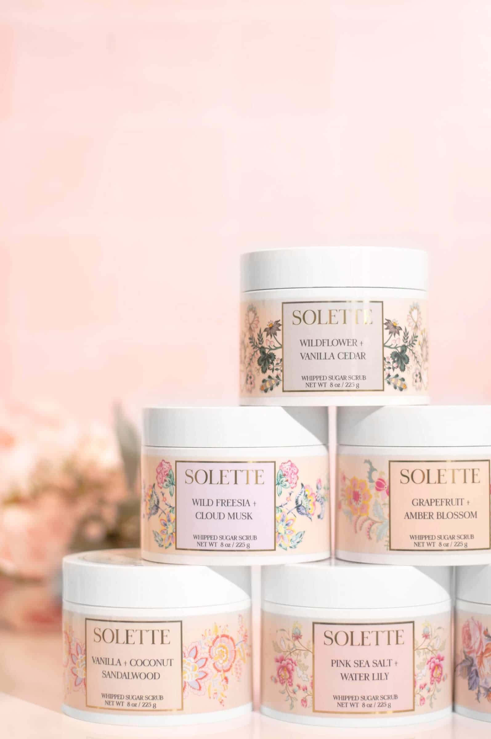 exfoliate before or after shaving body scrub group on pink background