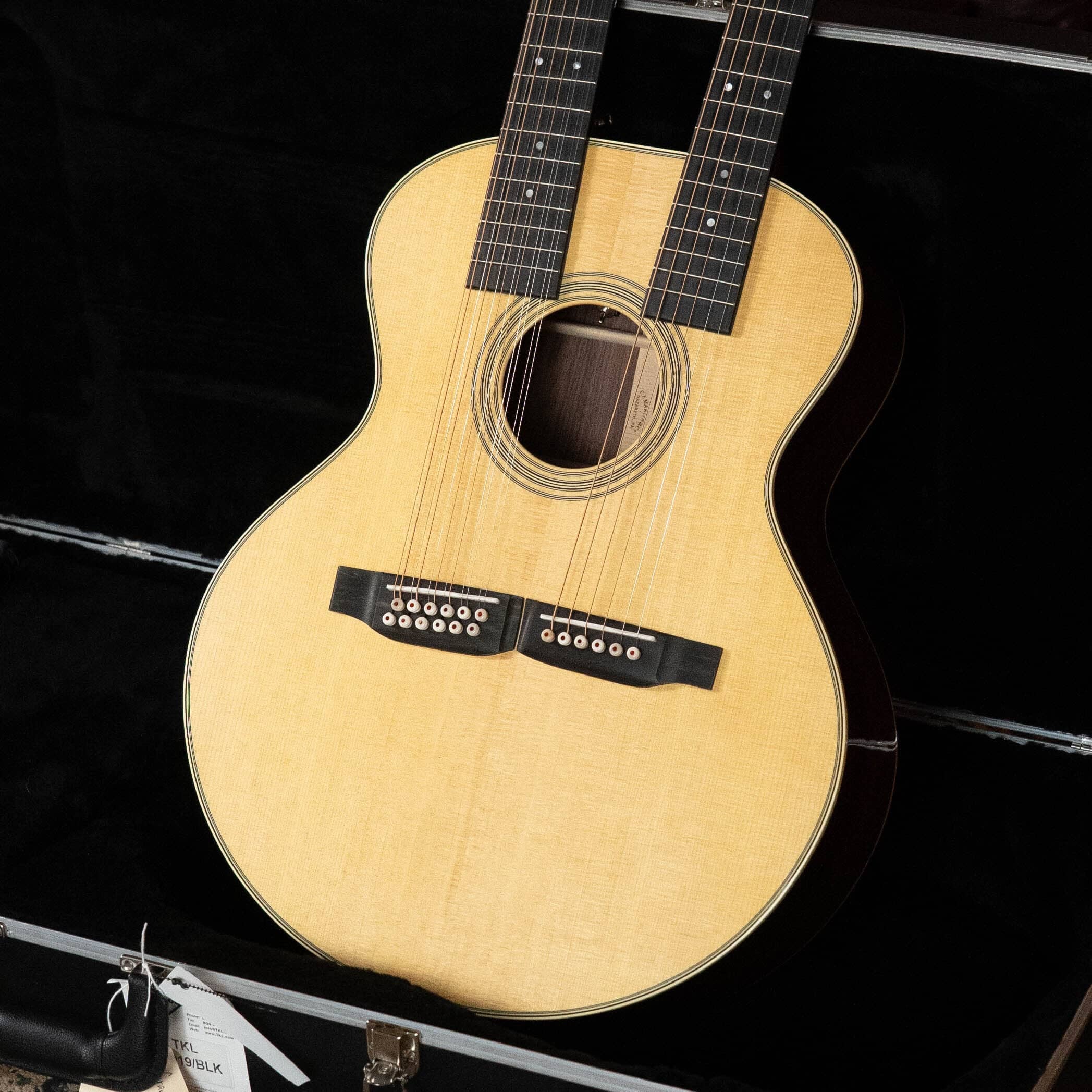 Martin Grand J-28E DN double neck guitar with 12-string and 6-string necks in an open case
