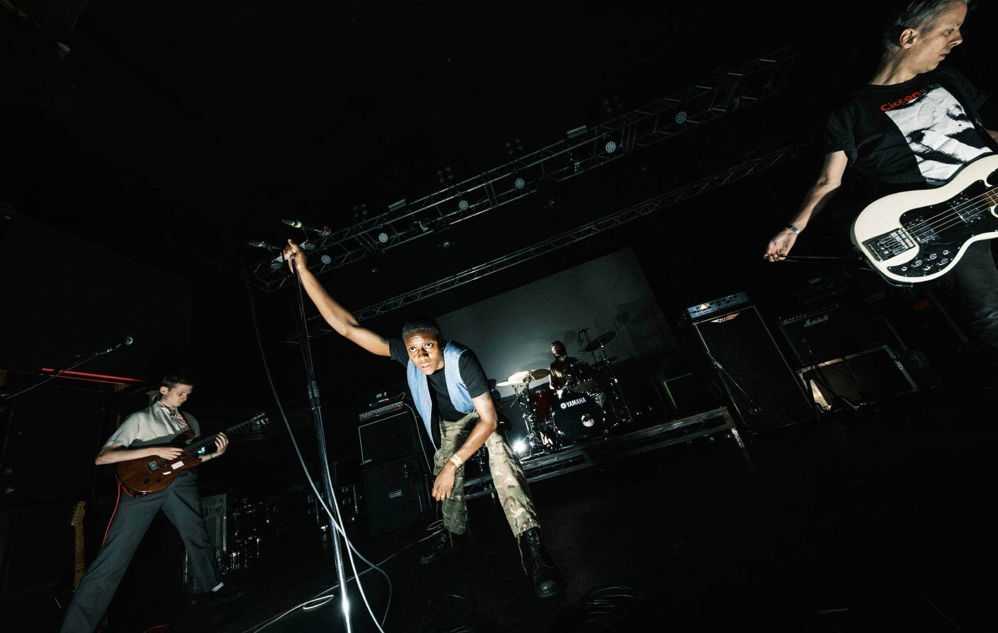 The None live performance, photo by Robert Barrett Photography
