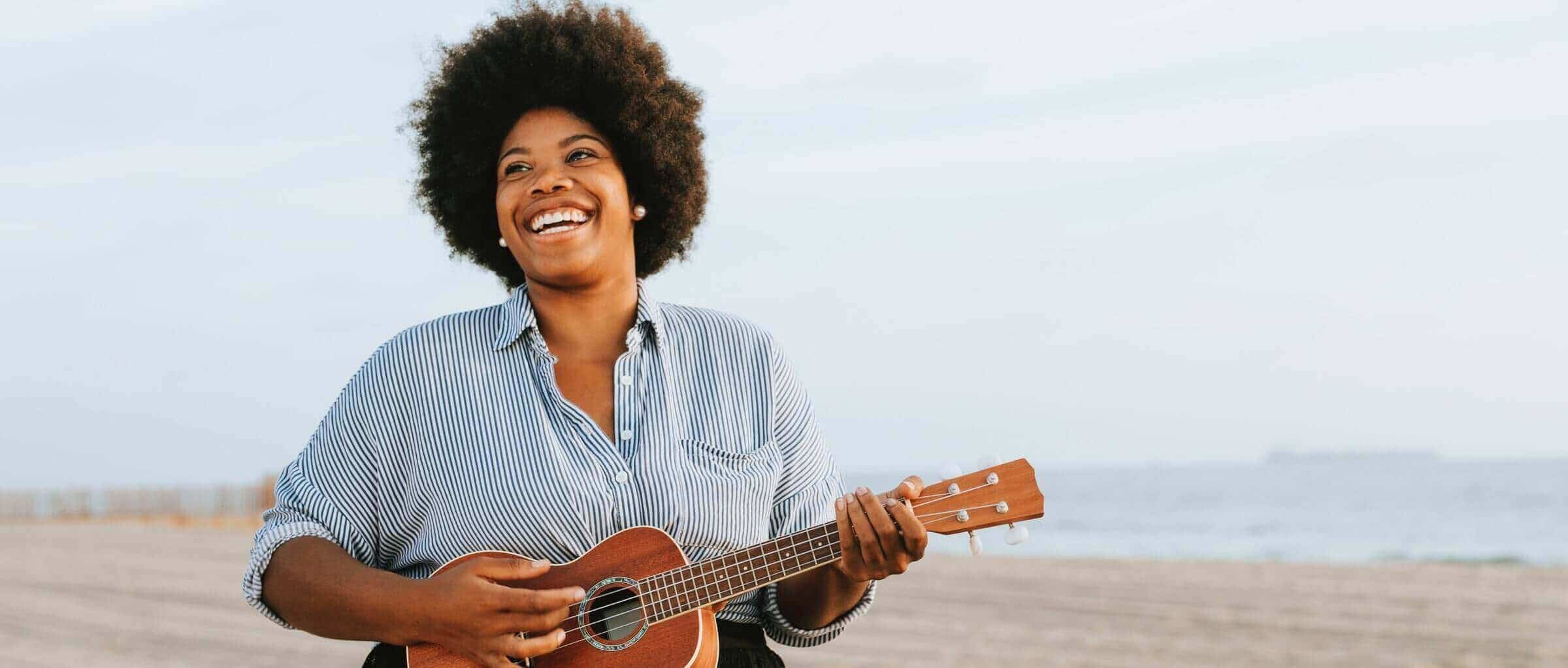 girl-playing-uke-on-beach.jpg
