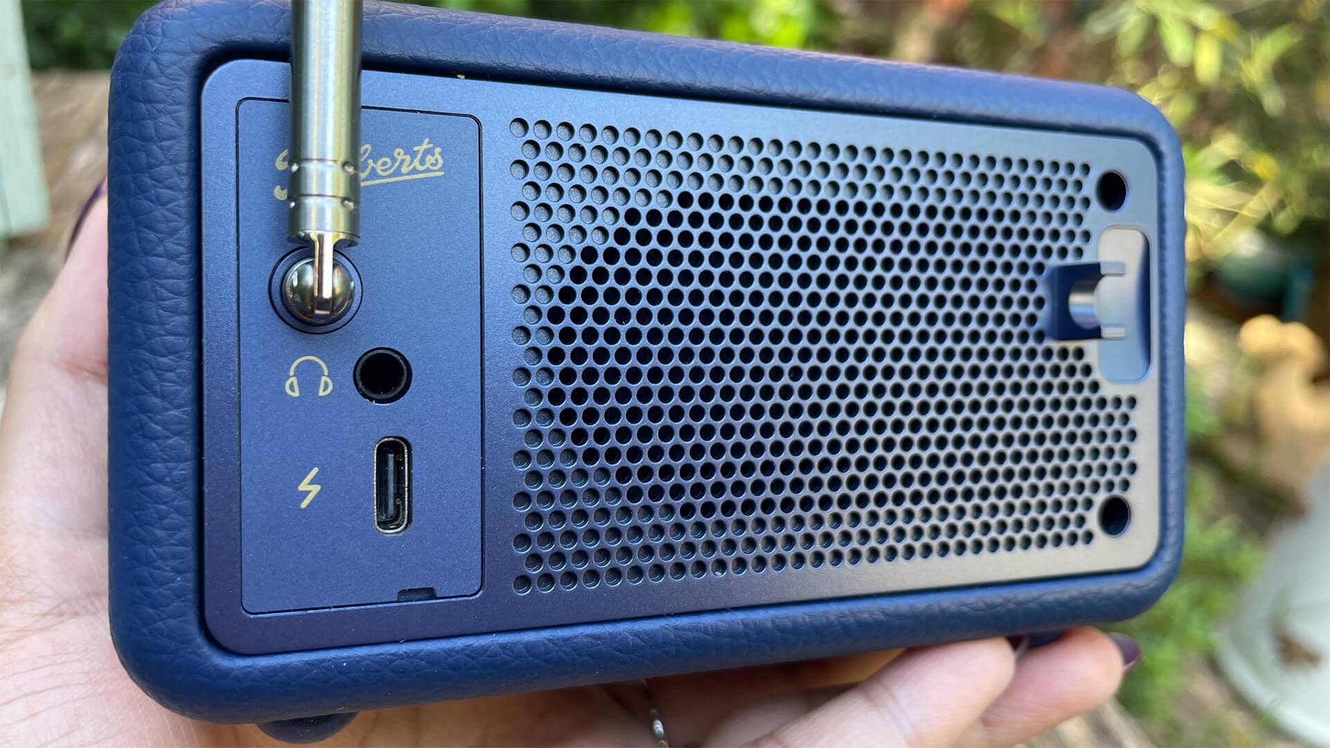 Back view of Roberts Revival Petite 2 held in hand