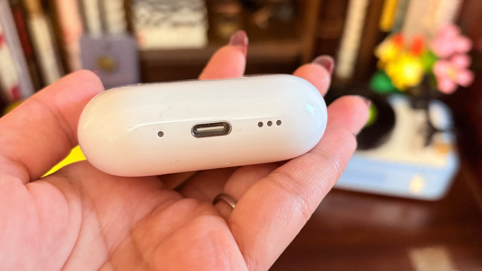 Close-up on AirPods Pro 3 earbuds displaying their sleek design