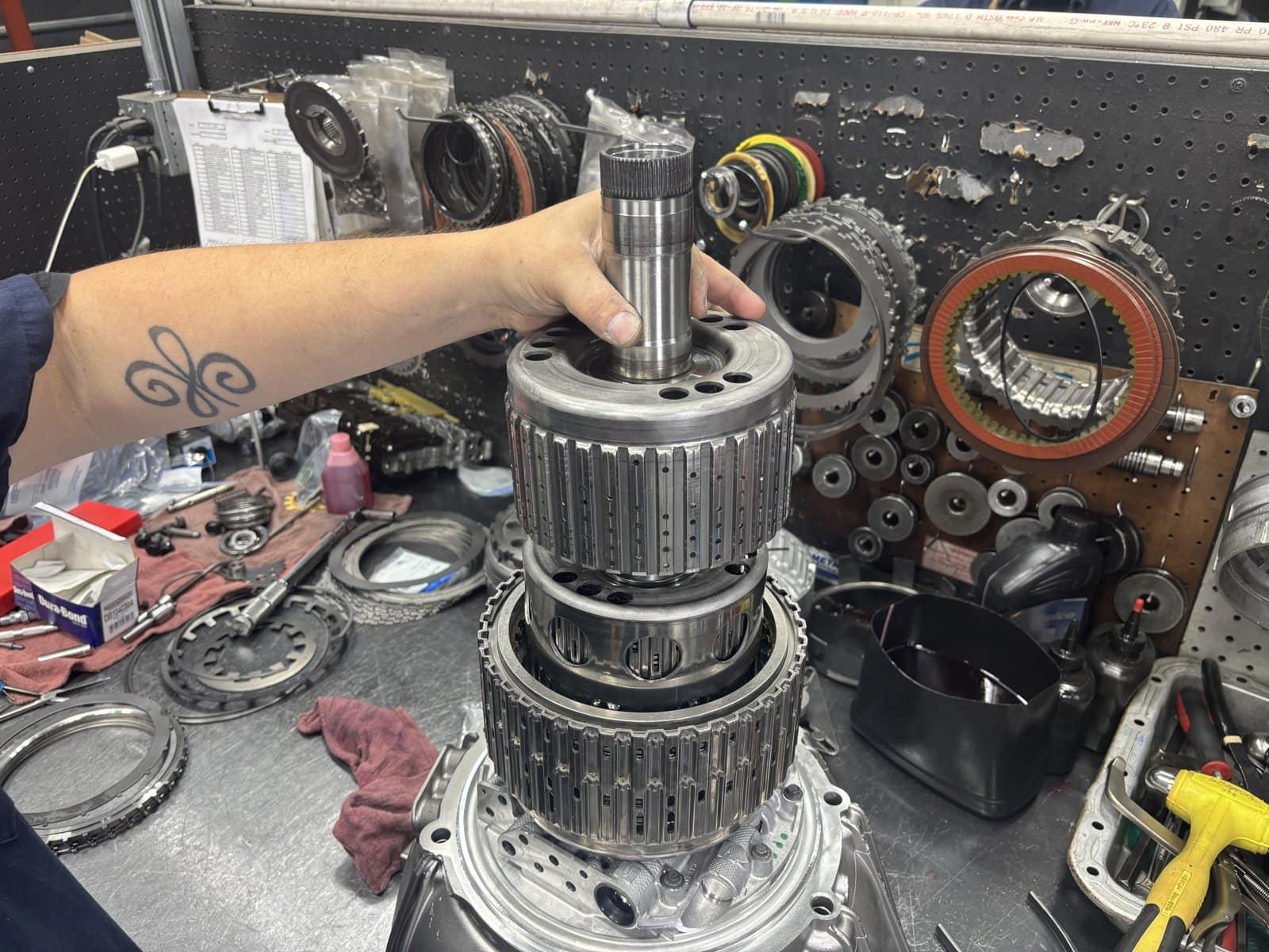 Stacked clutch drums from a 6L80E during a Gearstar build