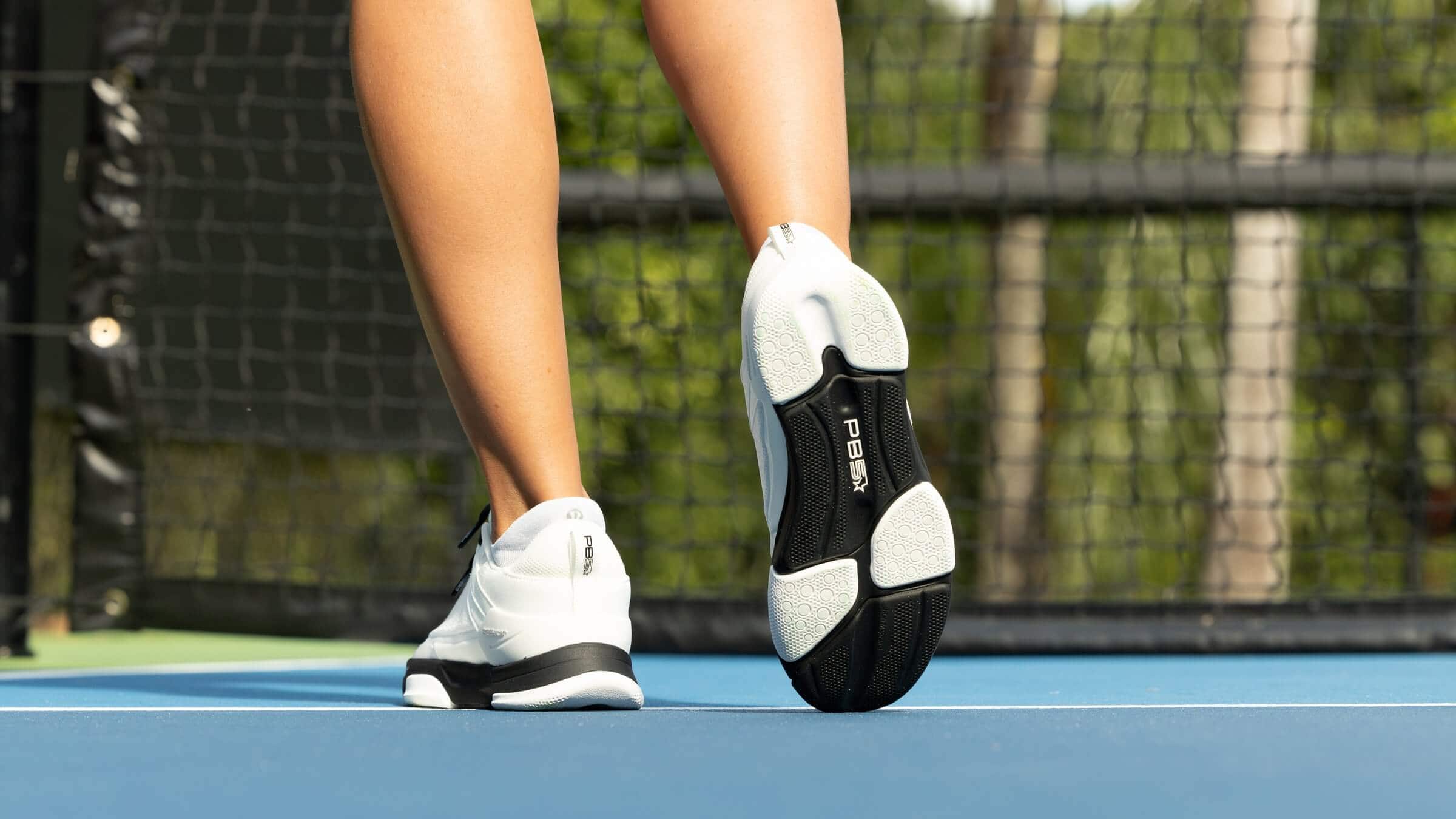 Close up shot of black and white PB5 Court 2 shoes from behind