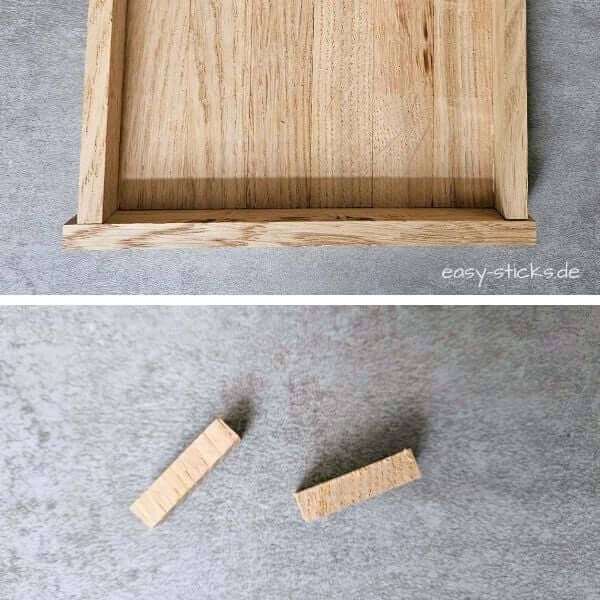 Holzstäbchen für den Rahmen mit einer kleinen Säge kürzen
