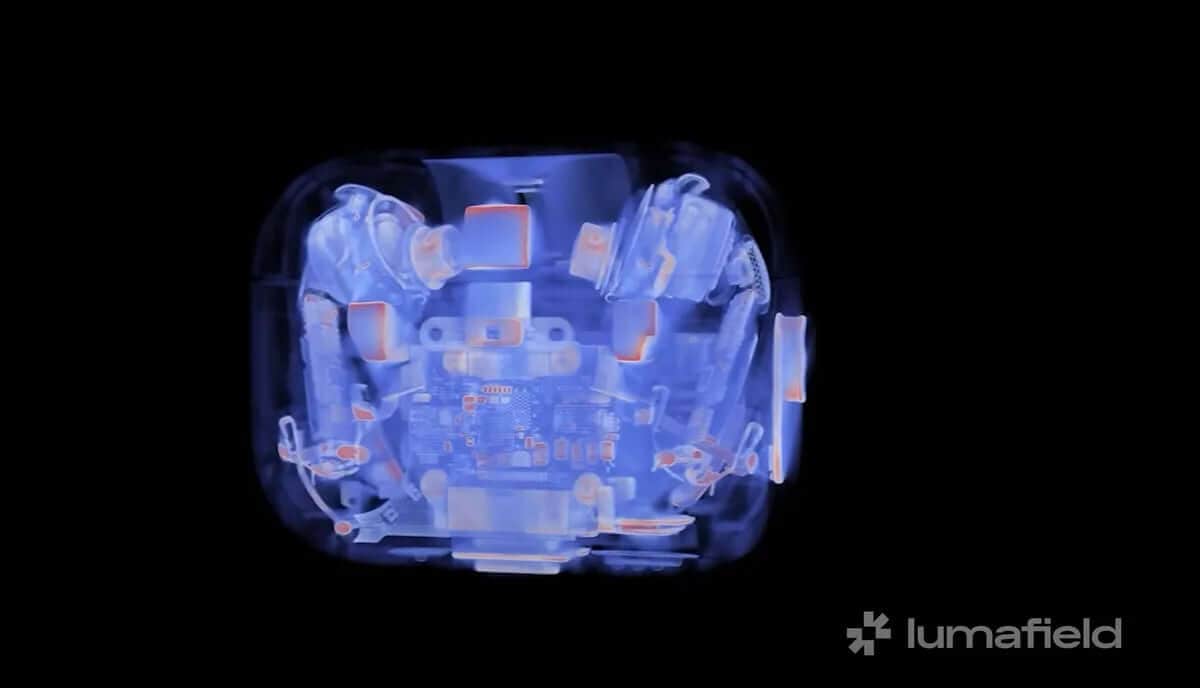 Internal view of AirPods Pro 3 teardown showing glued components