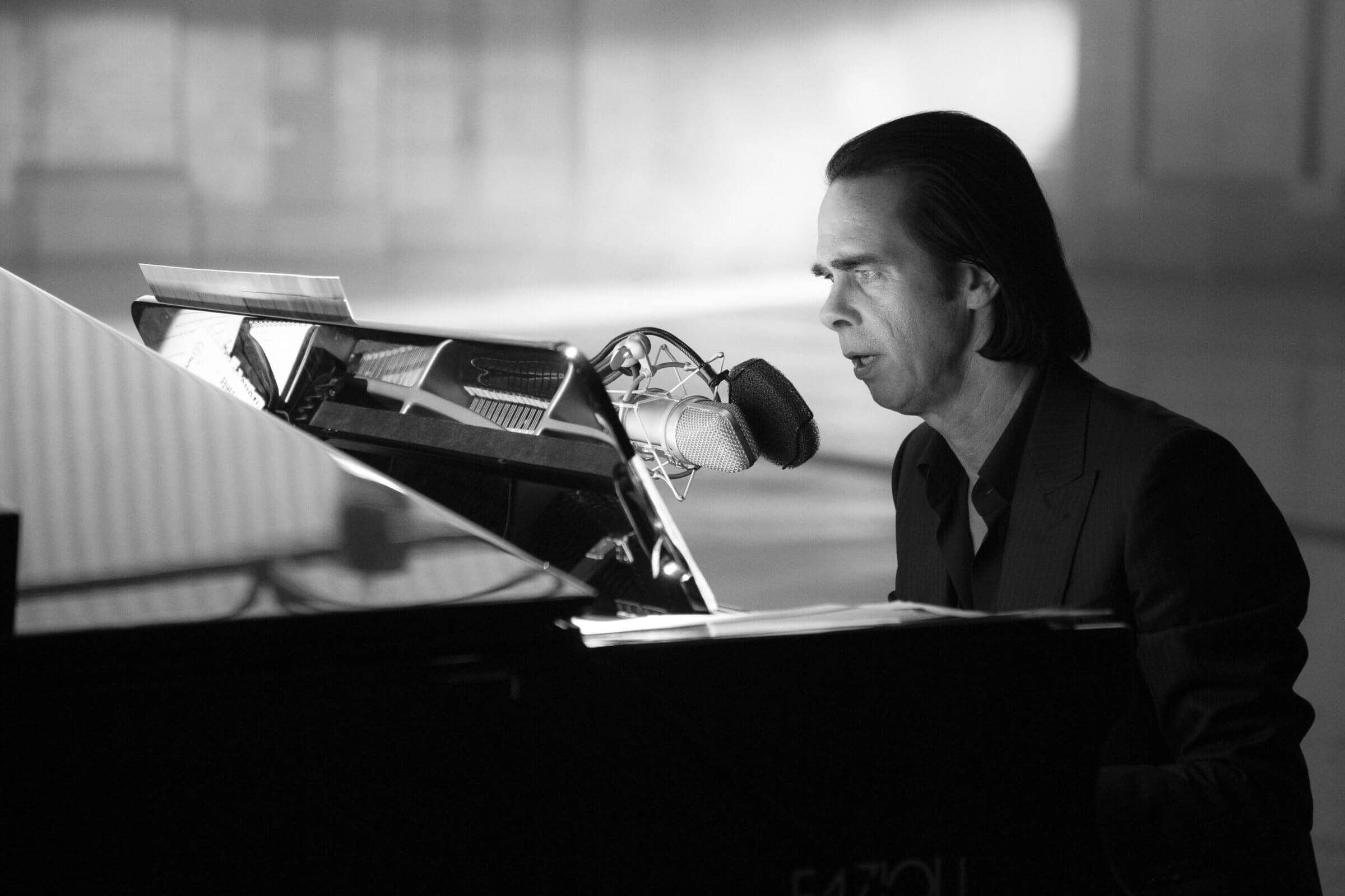 Nick Cave performing live, photo by Joel Ryan