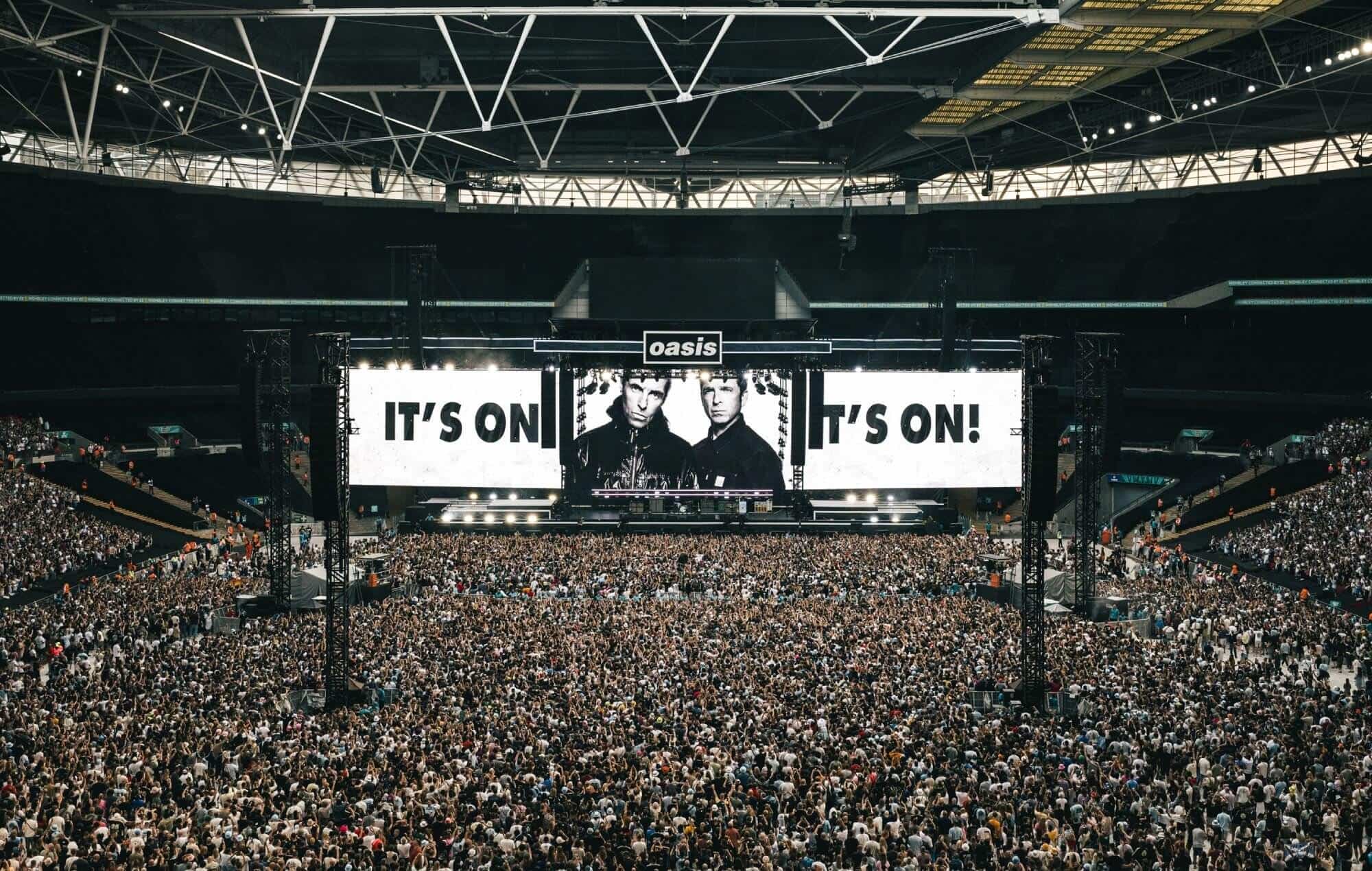 Oasis performing live in London’s Wembley Stadium