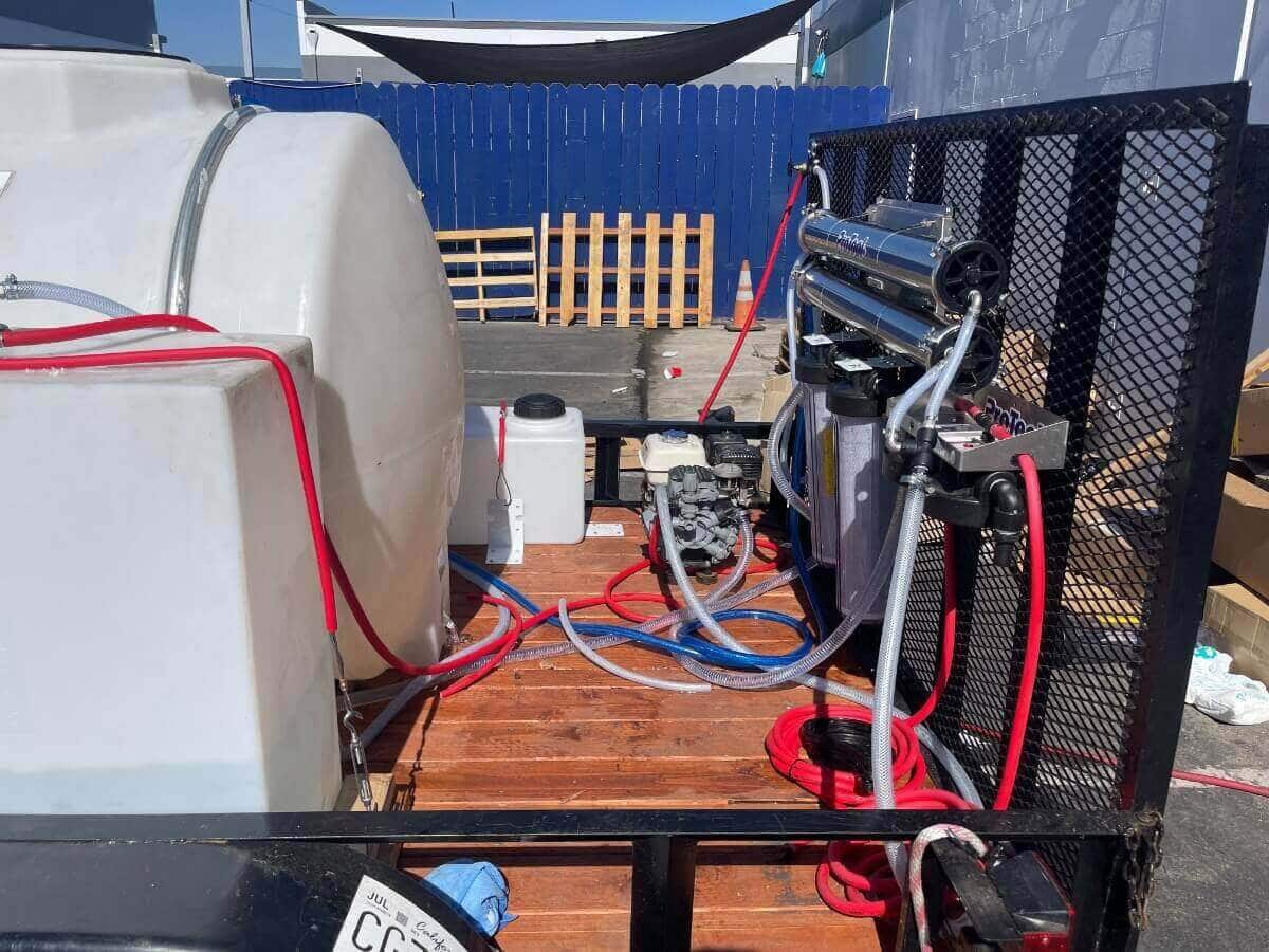 Pump and filter assembly on ProTool drone cleaning trailer