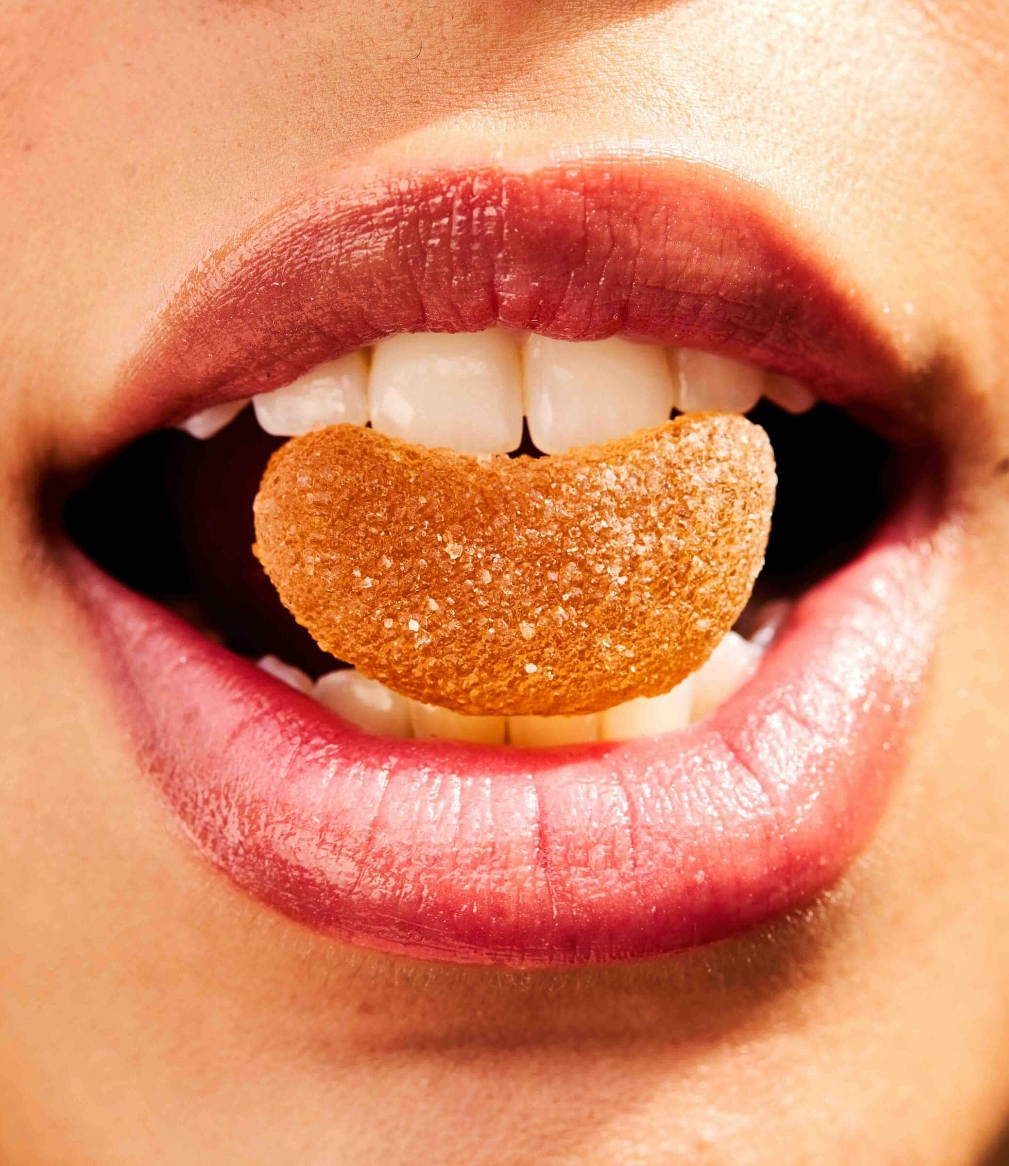 Valentine's Day gifts CBD Gummy fruit slice in mouth