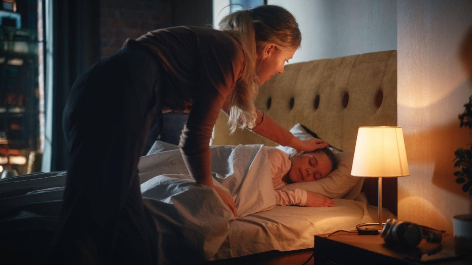 A Mom Trying Wake Up Her Child to Go to School