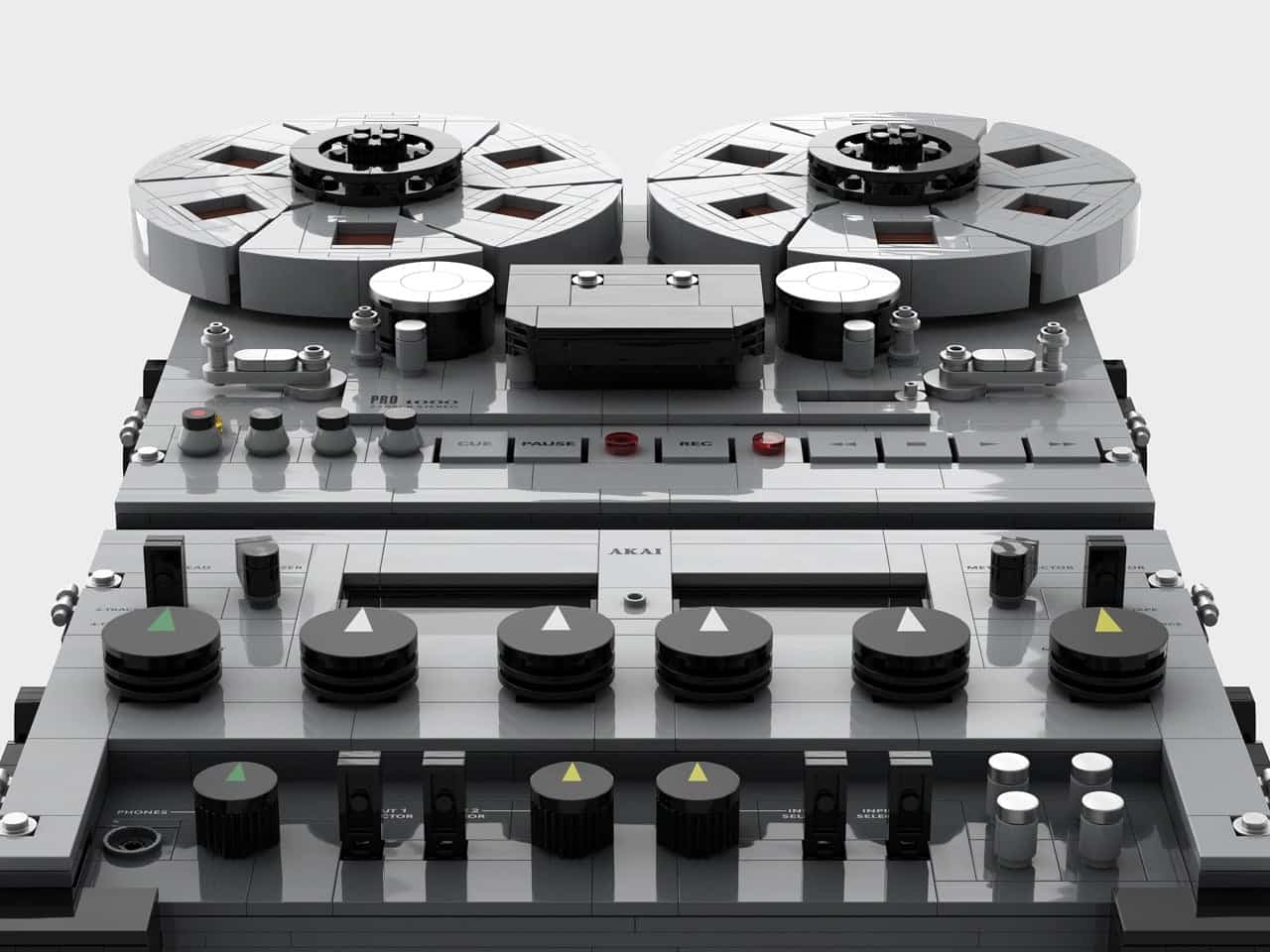 Close-up of the LEGO AKAI deck’s amber VU meters