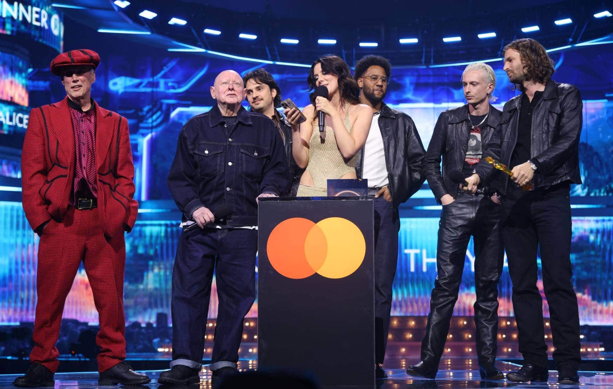 Wolf Alice celebrates winning Best British Group at the 2026 BRIT Awards.