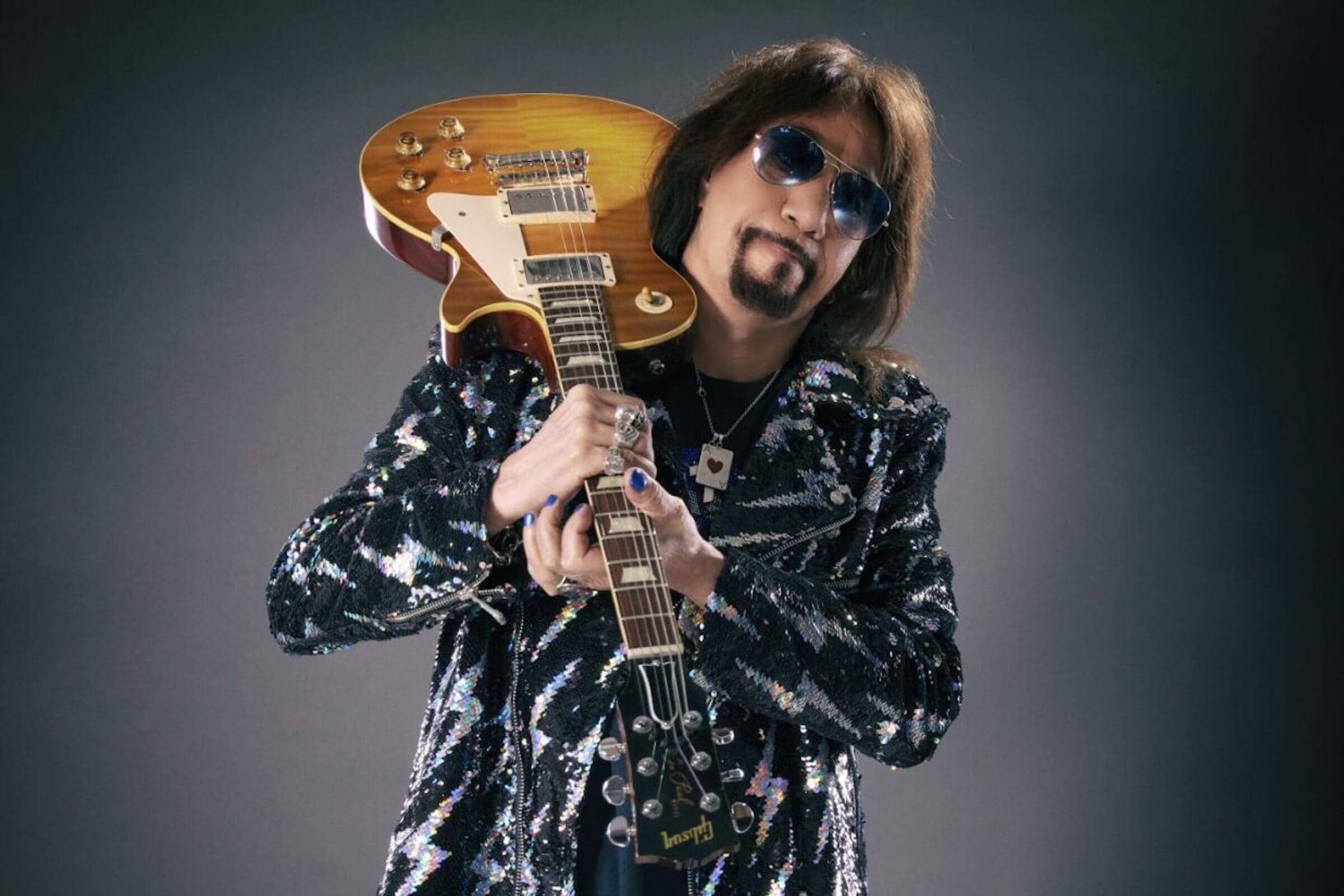 Ace Frehley in his signature Spaceman look during a live performance.