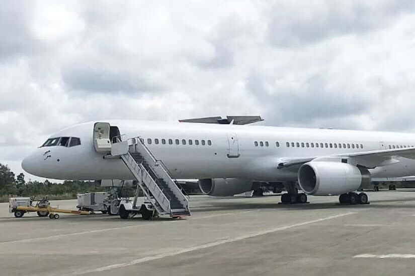 Jeffrey Epstein's boeing 727 on an airport apron.