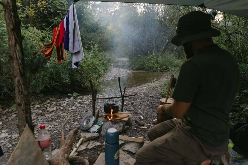 Ukrainian war veteran Serhii at a healing ceremony with shamans administering ayahuasca.