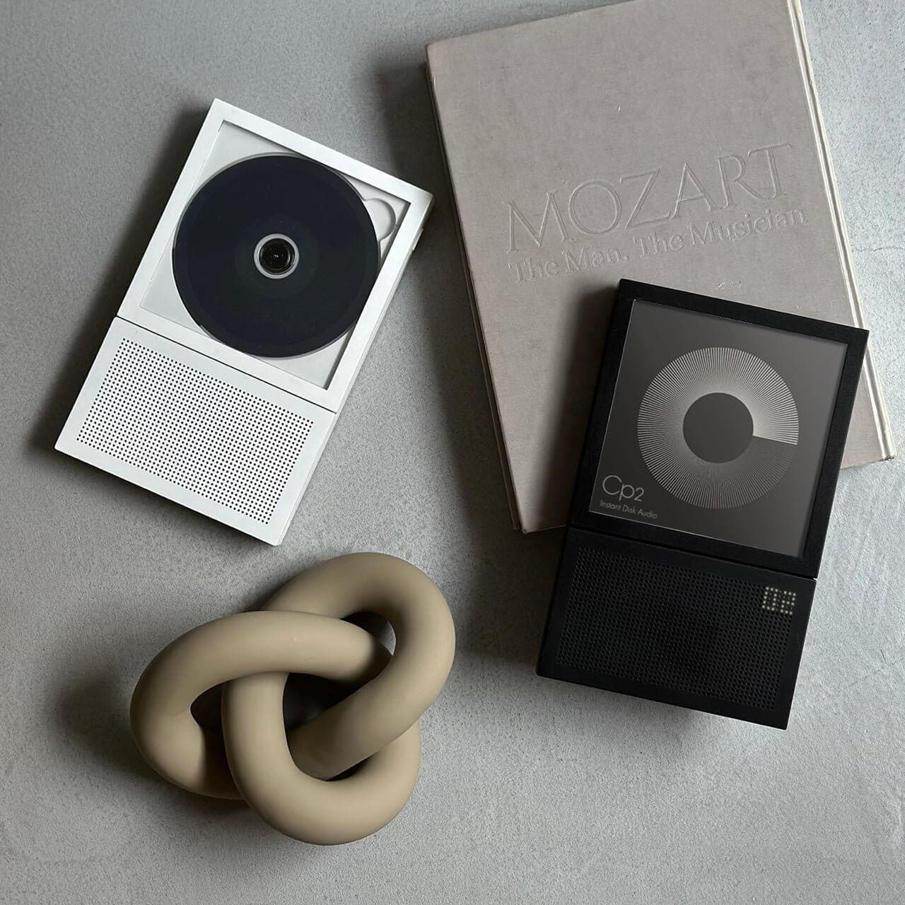 Portable CD Cover Player displaying album art