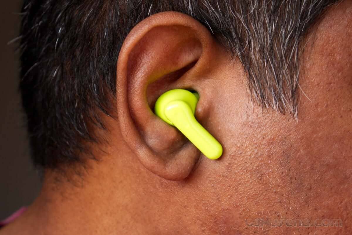 Lifestyle shot of the earbuds in use