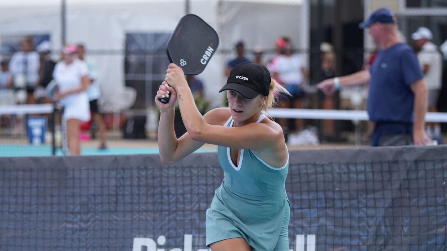 Hannah Blatt about to swing pickleball paddle