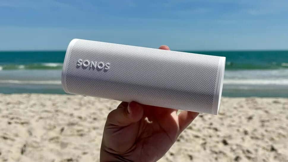 Sonos Roam 2 in black on a wooden table