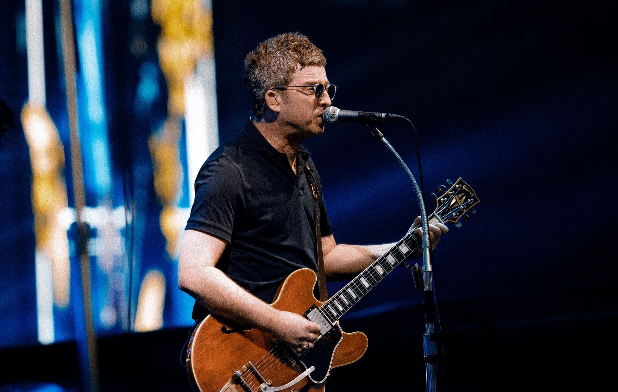 Noel Gallagher on stage during the Heaton Park finale.