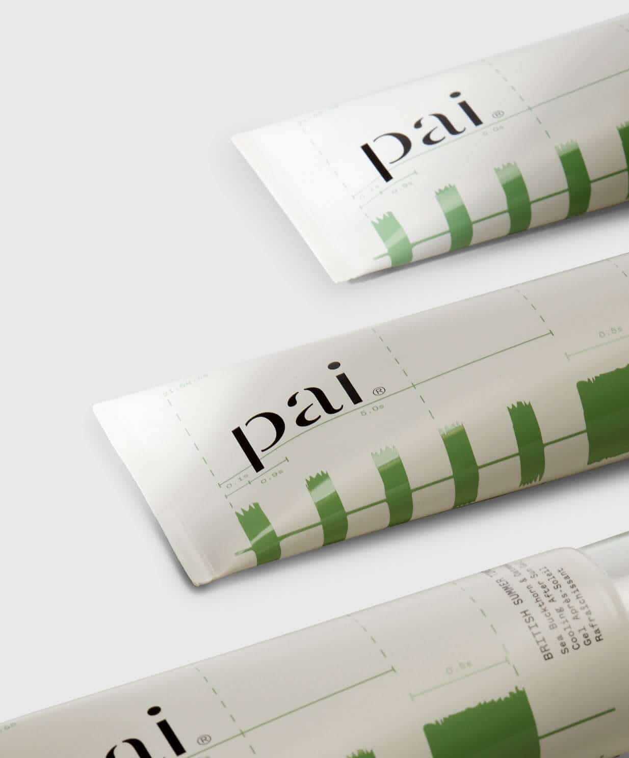 Three tubes of Pai After Sun cooling gel with distinctive green brush-stroke pattern on white packaging