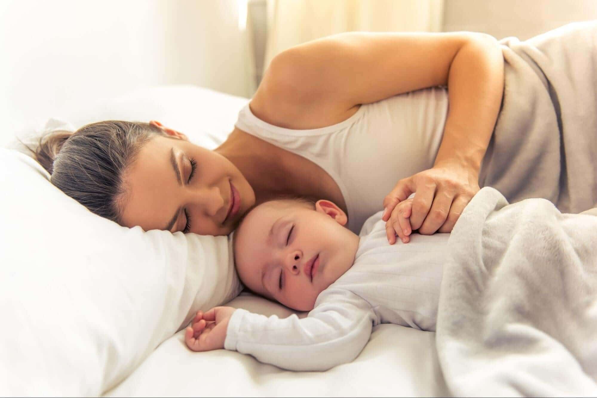 Mother and Baby Sleeping Together in the SHEEX Temperature Regulating Sheets