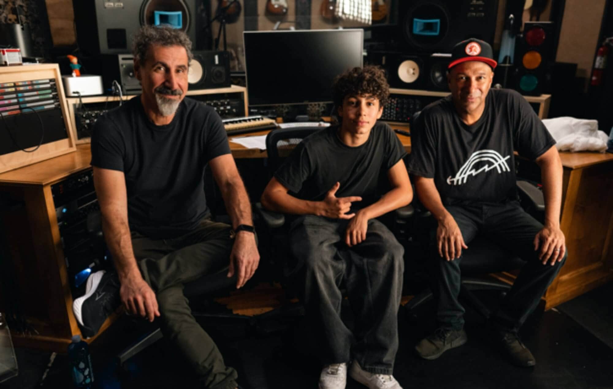 Tom Morello Joins Forces with Serj Tankian and Son Roman for Potent Single ‘Adjourn It’