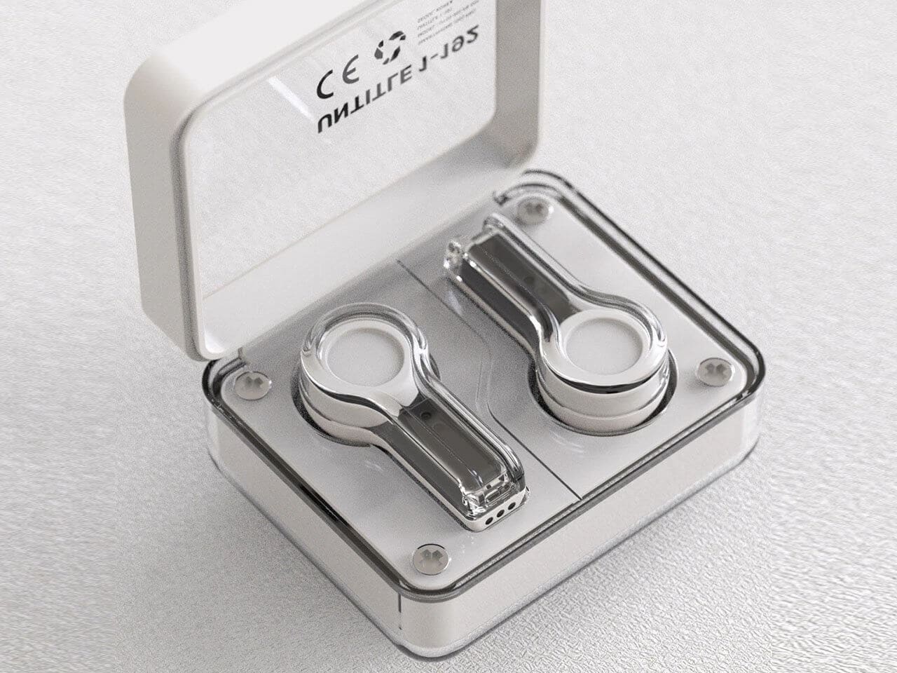 Close-up of earbuds showcasing smooth contours and potential touch surfaces.