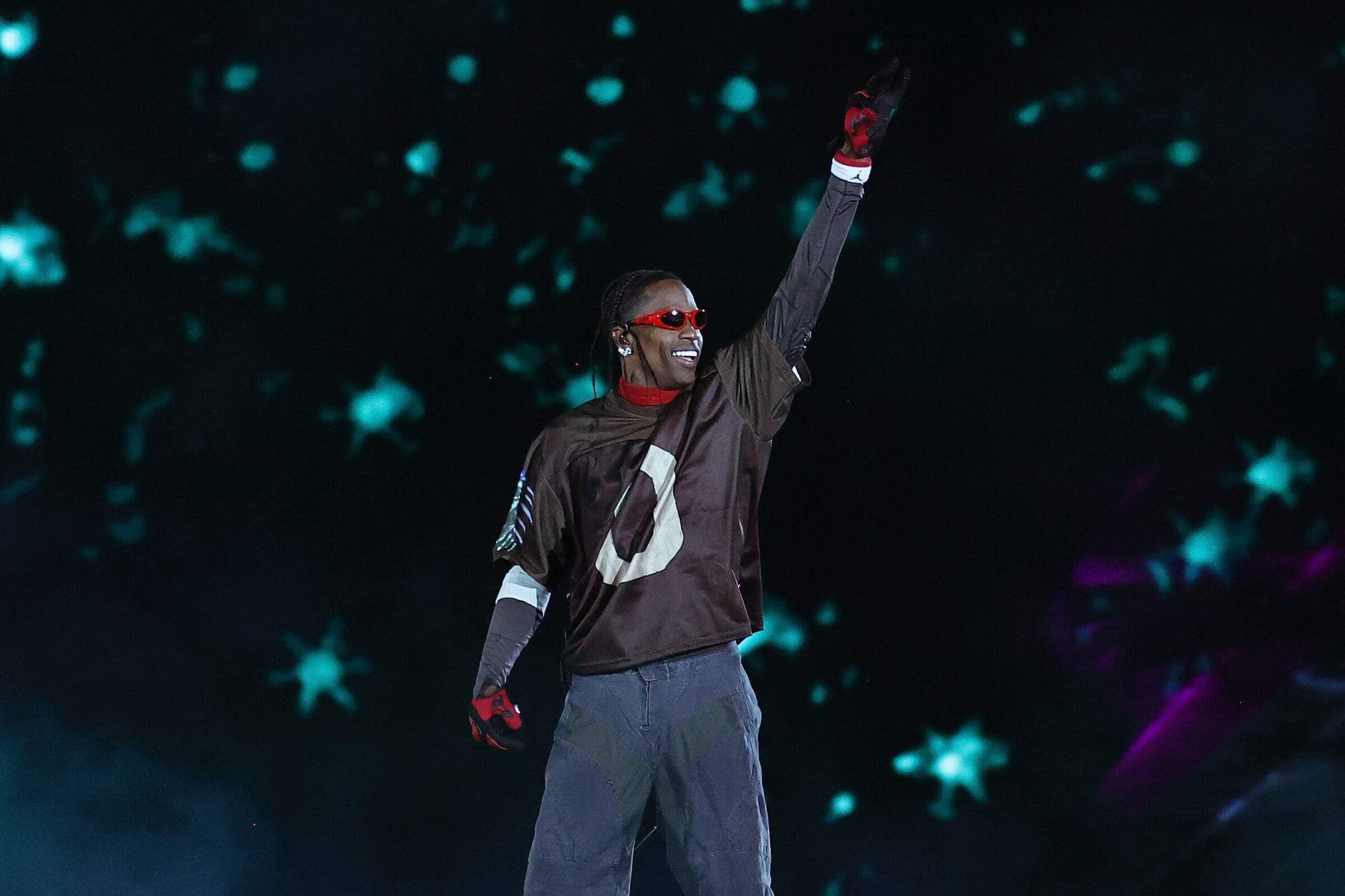 Travis Scott performing shirtless in ‘Dumbo’ video