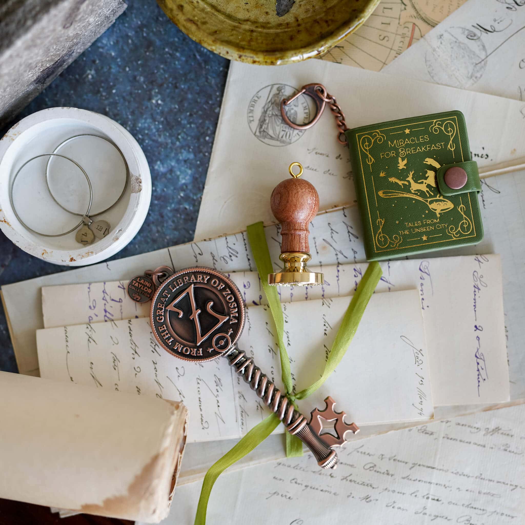 Great Library of Zosma Key in copper color with mini Miracles for Breakfast book charm and moth wax seal charm