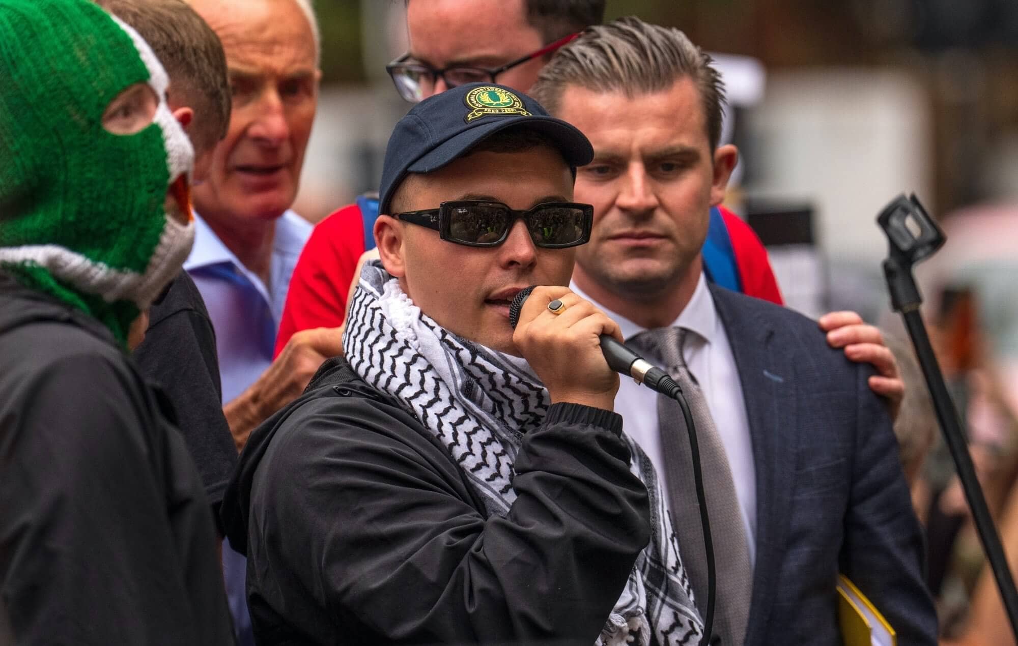 Kneecap's Liam Óg Ó hAnnaidh (aka Mo Chara) outside court, photo by Carl Court/Getty