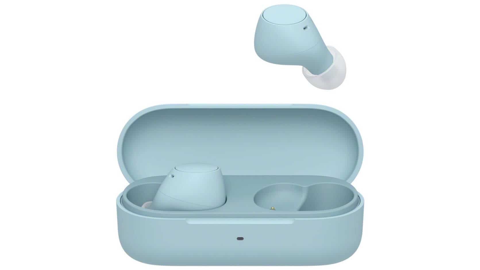 Close-up of Sony WF-C510 earbuds and blue charging case