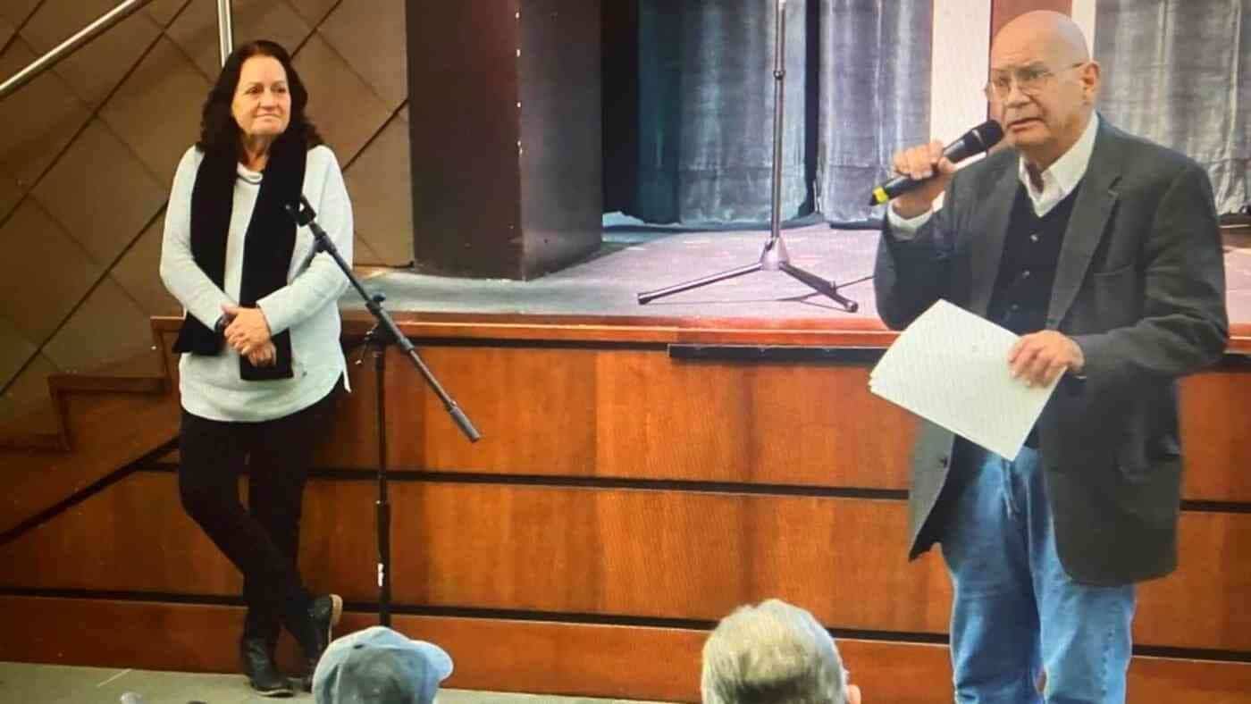 EPA press officer Jo Ann Kittrell (L) listens as Lee Select Board member Bob Jones delivers public comments on GE’s proposed PCB cleanup. // Source - Community Television Of The Southern Berkshires 