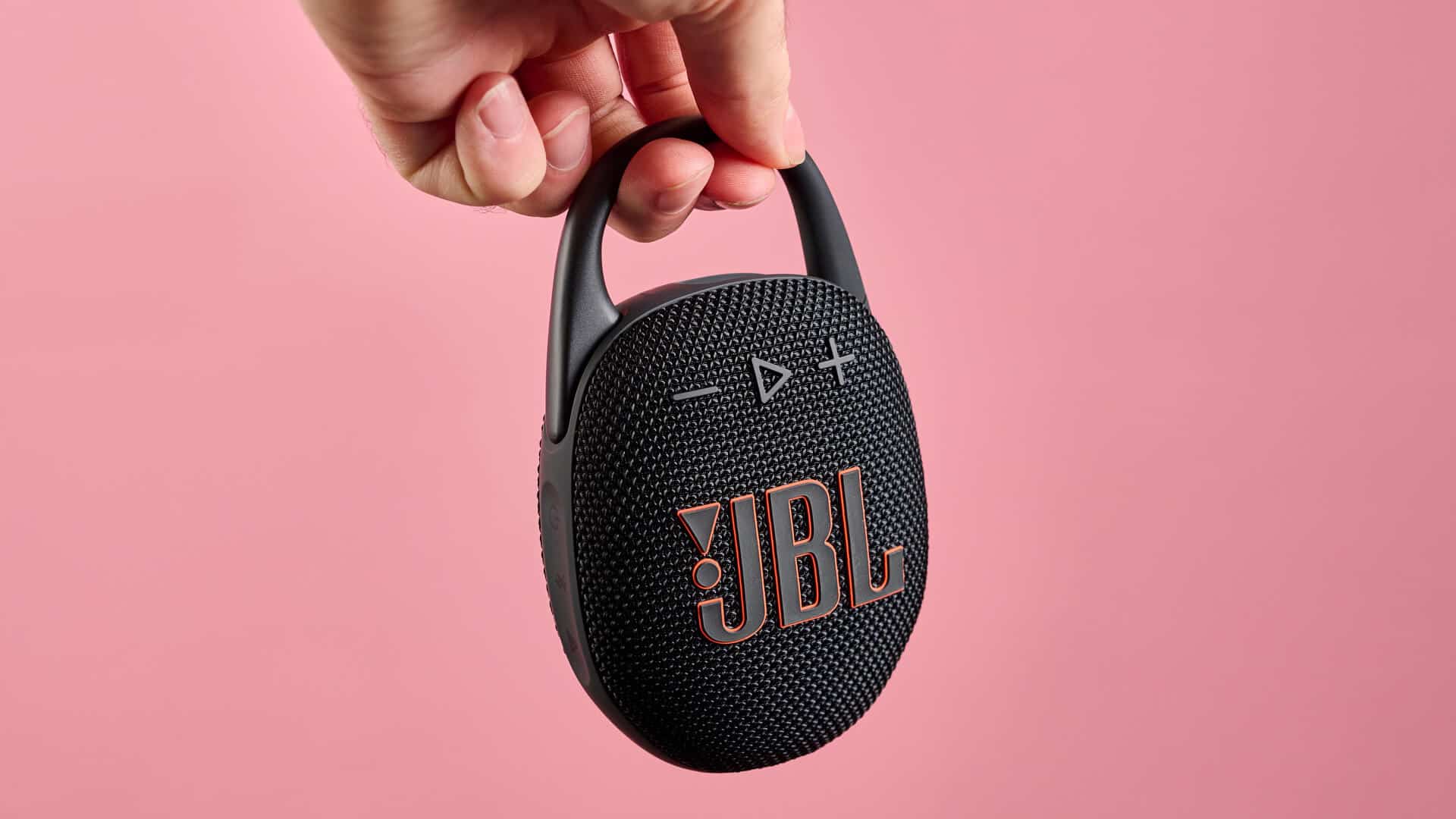 JBL Clip 5 held by carabiner