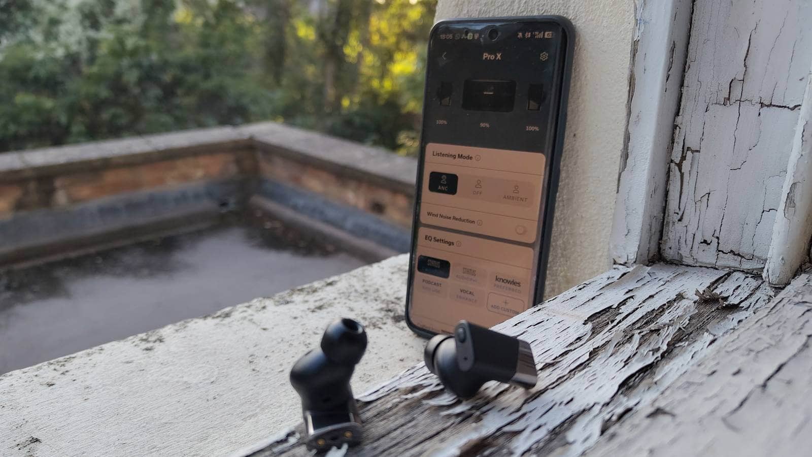 Another shot of the Pro X earbuds highlighting their refined aesthetics.