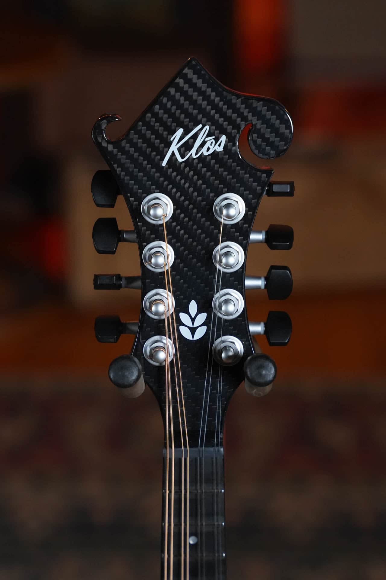 F5-style carbon fiber headstock on a KLOS F-style mandolin with chrome tuners